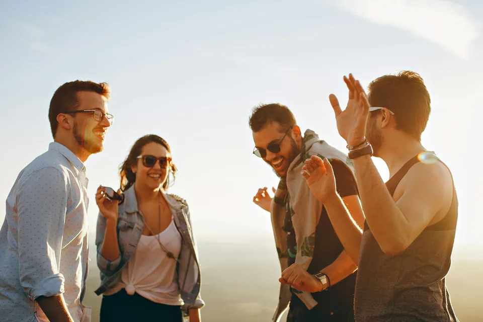 People standing together and talking outdoors